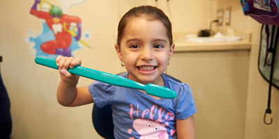 girl-with-toothbrush