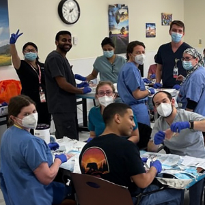 A group of medical students enjoying a "Mega Noon" Conference at the Pediatric Residency offered at St. Christopher's Hospital for Children