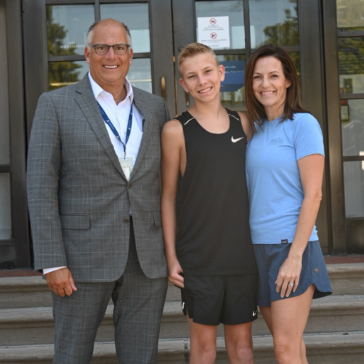 Dr. Charles F. Barbera with Beth McEldorney and her son.