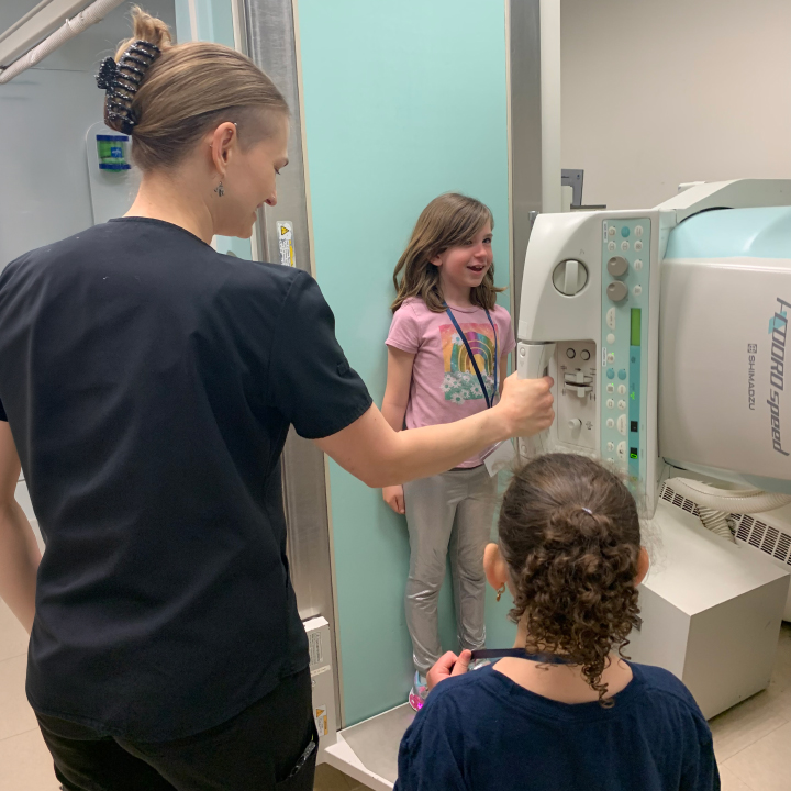 Elementary school children learn about imaging equipment at Take your Child to Work Day at Tower Health